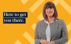 Woman with the text "Here to get you there."