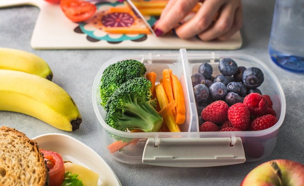 A lunch box containing health snacks.