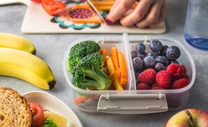 A lunch box containing health snacks.